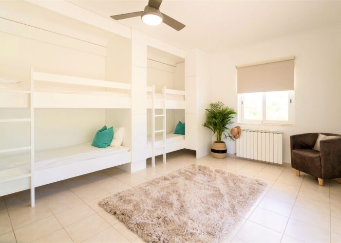 6 bed Shared dorm bedroom with bunk beds at Surf House in Praia da Luz, Algarve.